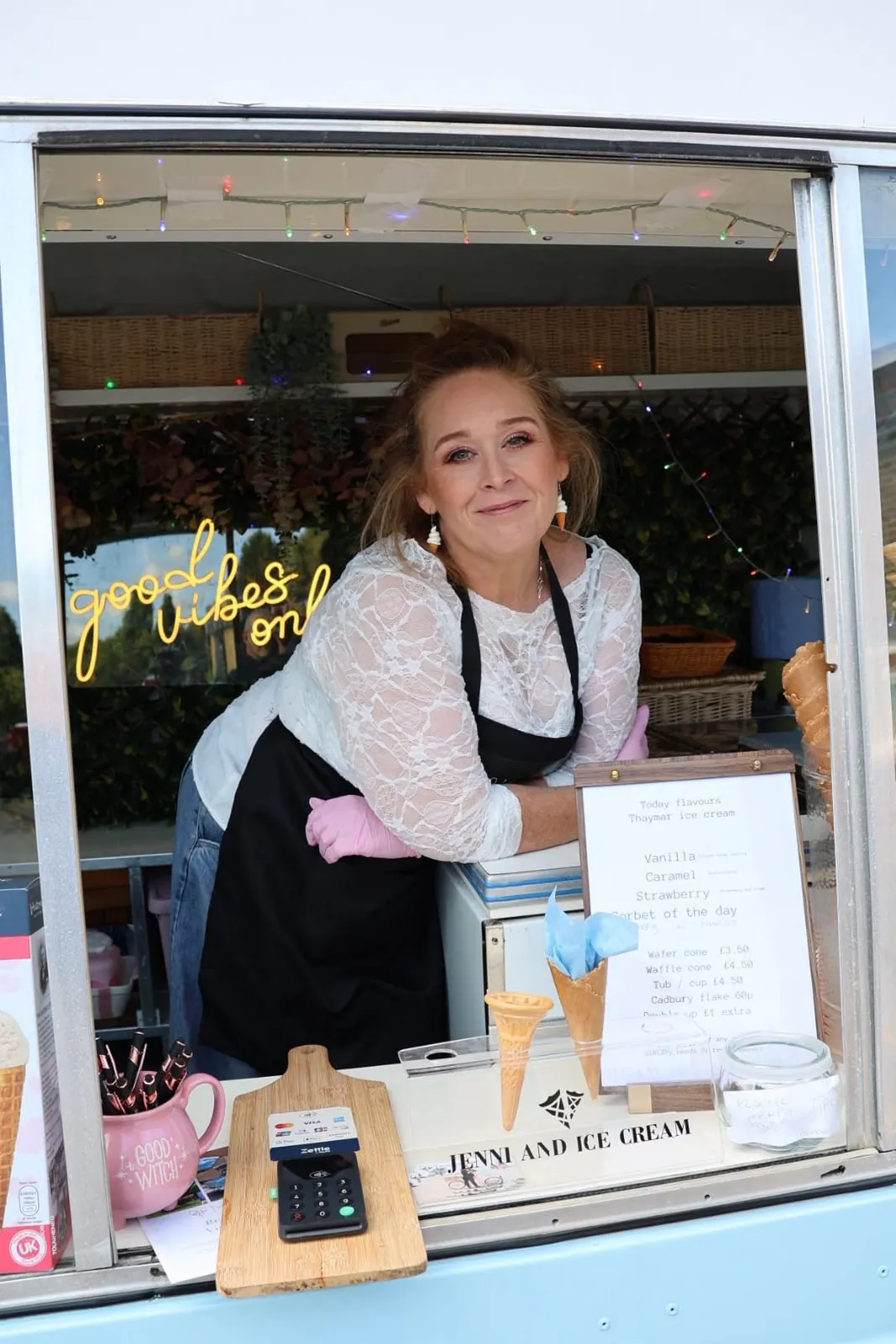 Jenni welcoming guests at Sherpa’licious’s serving window