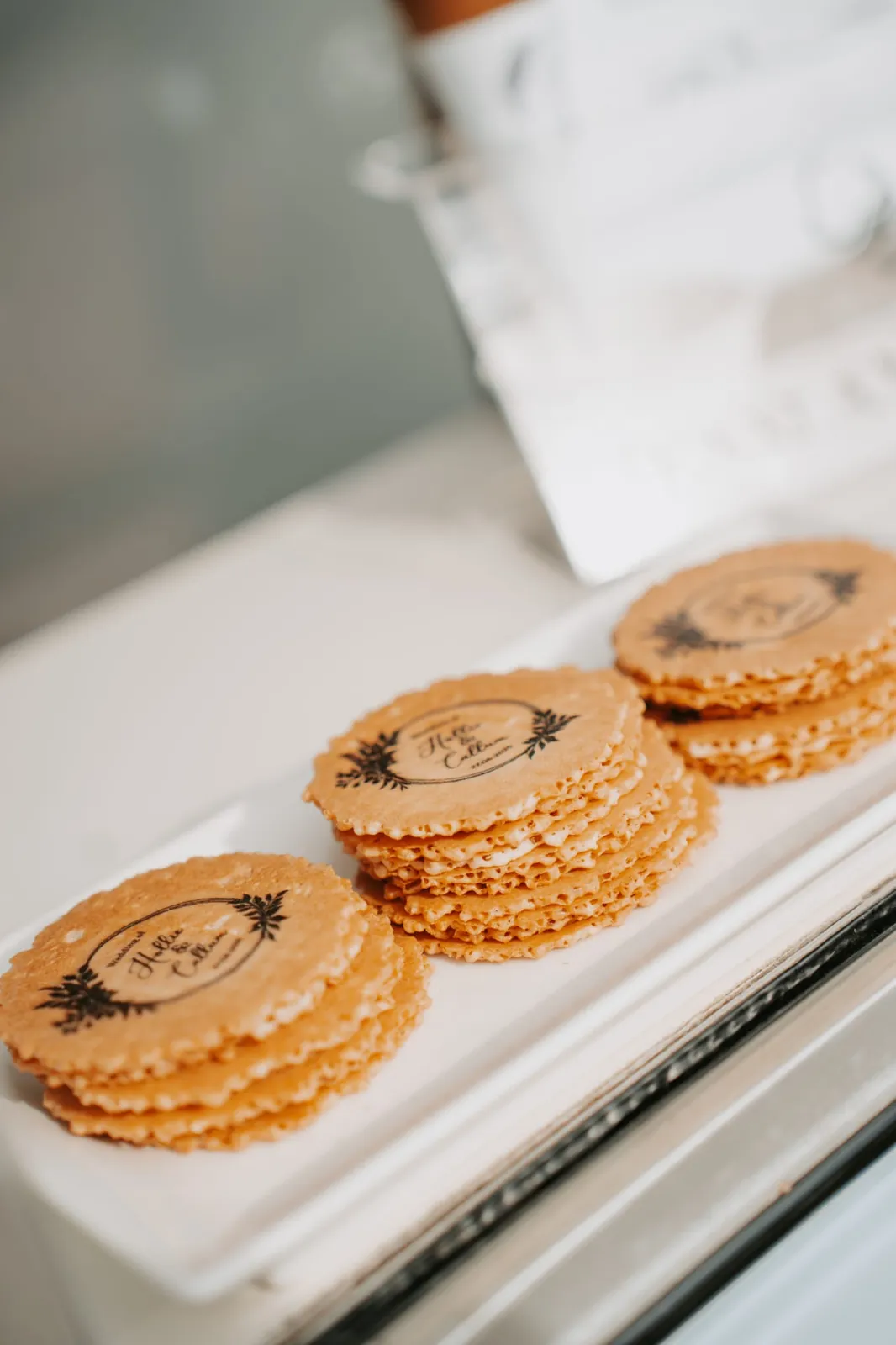 Edible personalised wafer toppers displayed at Sherpa’licious’s serving window